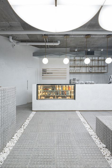 JISU Specialty Cafe / Tomas Mielnikowicz | ArchDaily Cafe Counter Design Coffee Shops, Cafe Interior Design Concept, Cafe Counter Design, Modern Cafe Interior Design, Sushi Shop, Cafe Counter, Coffee Desk, Reception Desk Design, Speciality Coffee Shop