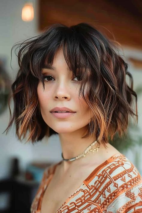 Woman with a shaggy textured bob and auburn highlights Trendy Hair Colour 2024, Auburn Bob With Bangs, Textured Layered Bob, Texture Short Hair, Medium Shaggy Bob, Short Haircuts With Bangs, Auburn Highlights, Hair Colouring, Shaggy Bob