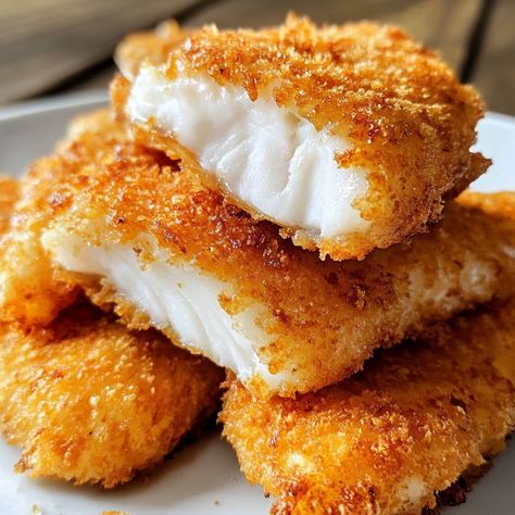 🐟🍴 Discover the perfect crunch with our Extra Crunchy Fish Fillet—a crispy, satisfying dish that’s a hit with everyone! 🐟🌟 #CrunchyFish #SeafoodDelight Extra Crunchy Fish Fillet Ingredients: Fish fillets (4, any white fish) Flour (1 cup) Cornstarch (1/2 cup) Baking powder (1 tsp) Salt (1/2 tsp) Pepper (1/2 tsp) Eggs (2) Cold water (1 cup) Oil (for frying) Instructions: Mix flour, cornstarch, baking powder, salt, and pepper. Dip fish in flour mixture. Beat eggs and mix with cold water. Dip... Crunchy Fried Fish, Fried Fish And Spaghetti, Southern Fried Fish, Fish Goujons, Crunchy Fish, Crispy Fried Fish, Fish Fried, Pepper Dip, Burger And Chips