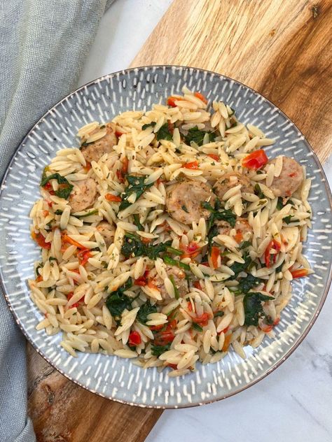 Easy 5 Ingredient Chicken Sausage Orzo with Spinach and Tomatoes - The Natural Eater One Pan Chicken Sausage Orzo, Chicken Sausage And Spinach Recipes, Chicken Sausage With Orzo, Orzo With Chicken Sausage, Spinach Feta Chicken Sausage Recipes, Orzo Chicken Sausage, Chicken Sausage Orzo Recipes, Spinach And Feta Chicken Sausage Recipes, Chicken Sausage Orzo