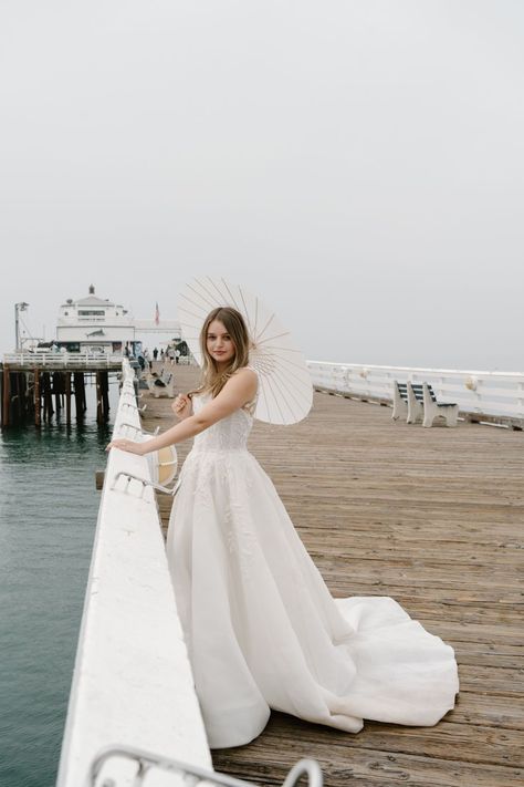 Post Wedding Photoshoot on The Malibu Pier | Outdoor Bridal Portraits | Los Angeles Photographer | This Malibu Pier wedding photoshoot with J + D was the sweetest! Get inspired by more Malibu wedding dress ideas, Malibu wedding venues, Malibu wedding aesthetic, and Malibu wedding photography! Book Natasha as your Malibu wedding photographer or Los Angeles wedding photographer at natashadaboubphotography.com! Post Wedding Photoshoot, Malibu Wedding Venues, Pier Wedding, Malibu Pier, Malibu Wedding, Wedding Dress Ideas, Photography Book, Most Asked Questions, Los Angeles Wedding Photographer