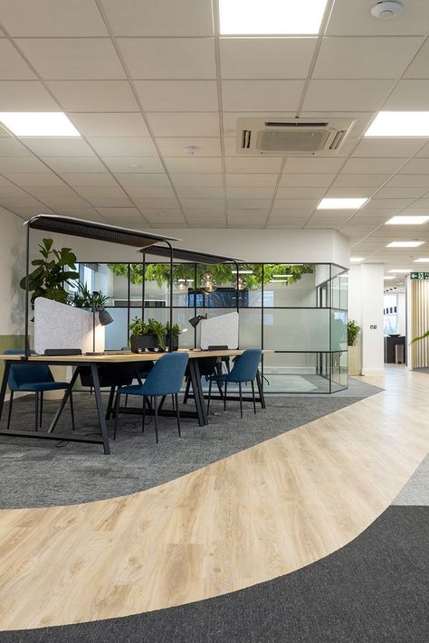 Our Moduleo 55 Woods, Blackjack Oak 220 LVT, Art Exposure and Rudiments carpet tiles were selected to transform this office space. Walkways were defined by mixing the finishes and texture between LVT and carpet, while a neutral palette provides a calming aesthetic. Use the link to request free samples to help with your next interior project. #office #flooring #fitout #interiordesign #architecture #commercialdesign Carpet Tiles Design, Office Flooring, Entrance Signage, Wood Walkway, Flooring Texture, Vinyl Floors, Office Materials, Separating Rooms, Carpet Texture