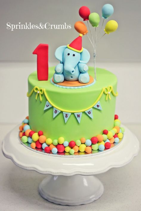 First Birthday Cake Boy A Colourful Circus Themed First Birthday Cake Featuring An Elephant 1st Birthday Cake Ideas, One Year Birthday Cake, Circus Birthday Cake, 1st Bday Cake, Boys First Birthday Cake, Boys 1st Birthday Cake, Elephant Cakes, Homemade Birthday Cakes, 1st Birthday Cakes