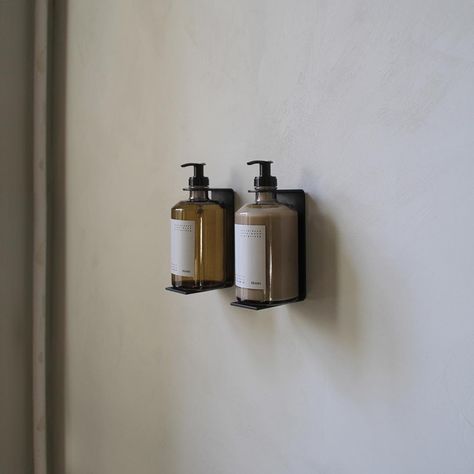 Wall Displays for our Hand Wash and Hand Lotion in matte powder-coated steel is available from selected stores and at framacph.com #stpaulsapothecary #framacph Apothecary Wall, Wall Mounted Drying Rack, Wall Mounted Soap Dispenser, Kitchen Surfaces, Matte Powder, Steel Wall, Hand Lotion, Ylang Ylang, Shower Wall