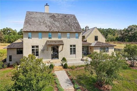 10515 Serenbe Ln, Chattahoochee Hills, GA 30268 - Home For Sale and Real Estate Listing - realtor.com® Belgian Farmhouse, Transitional Staircase, Transitional Fireplace, Country Mansion, Transitional Furniture, Transitional Lighting, Stucco Walls, Country Retreat, Transitional Modern