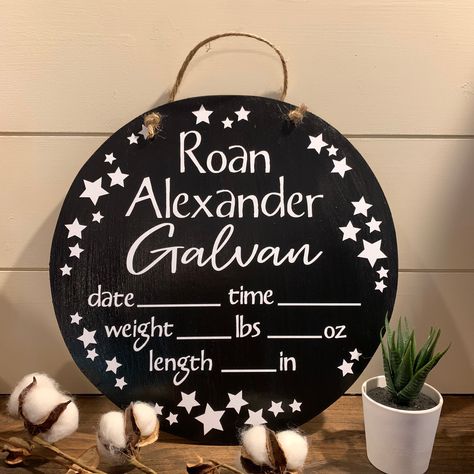 "This Stars Baby Door Hanger would be a great way to welcome the birth of your little one! This hospital/nursery door hanger is a 12\" x 12\" circle. If you don't see a color choice that matches your decor, choose \"CUSTOM\" for the color option, and message me with your custom color. It comes hand-painted with a white vinyl decal, jute hanger, and sealed for protection. If you decide on a black vinyl decal, please include this request in a buyer's note when you purchase.  Thank you so much for Baby Door Signs, Stars In Space, Baby Door Hanger, Hospital Door Hangers, Baby Door Hangers, Black Baby Boys, Door Hangers Diy, Baby Door, Hospital Birth