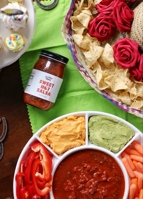 Two very important holidays are coming up.. Derby and Cinco de Mayo! I’m excited to team up with Screamin’ Mimi’s Salsa again to share inspiration to host your very own ‘Derby de Mayo’ party 🐎🎉 It’s a fun way to mix up the traditional derby party! I’ve put together everything you need: a menu, decor ideas, favors, and a recipe for Sweet Hot Pork Tenderloin Sliders. Screamin’ Mimi’s is a local company that makes my favorite Sweet Hot Salsa. It’s unlike any other salsa I’ve tried, a little sweet Kentucky Derby Cinco De Mayo Party, Derby De Mayo Party Ideas, Cinco De Derby Party Ideas, Pork Tenderloin Sliders, Tenderloin Sliders, Kentucky Hot Brown Sandwich, Brown Sandwich, Kentucky Derby Themed Party, Derby Party Food