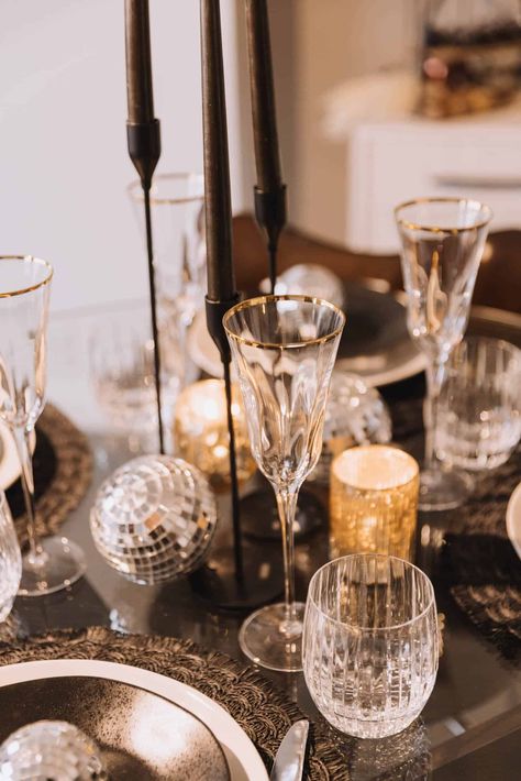 New Years Eve tablescape ideas with disco balls and beautiful glassware. Table Decorations For New Years Eve, New Years Dinner Decoration, Nye Decorations Table, New Year’s Eve Dinner Table, New Years Party Table Decor, Formal New Years Eve Party Ideas, New Years Eve Hosting Ideas, New Year Eve Dinner Table Decor, New Year’s Eve Dinner Party Ideas