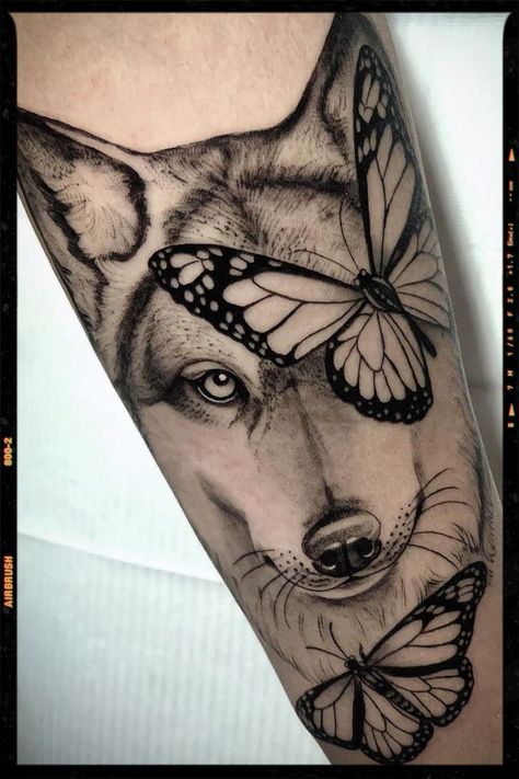 Wolf Memorial Tattoo For Women, Wolf Butterfly Tattoo, Wolf And Butterfly Tattoo, Wolf Eyes Tattoo, Wolf Eye Tattoo, Wolf Tattoos For Women, Animal Tattoo Ideas, App Filter, Blue Rose Tattoos