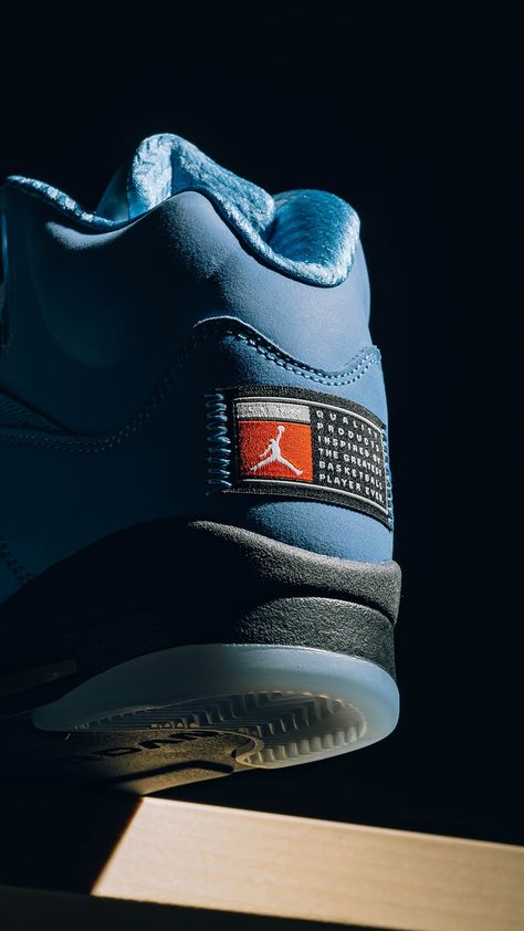 Paying homage to Michael Jordan's collegiate days, the Air Jordan 5 'UNC' is complete with a suede university blue upper and a Team Jumpman patch on the heel–releasing this Saturday, 3/4. Enter the draw: https://feature.com/products/air-jordan-5-retro-se-university-blue-black-white Puma Reference, Jordan 5 Unc, Jordan Unc, Shoes Fashion Photography, Blue Jordans, Shoes Photography, Hype Shoes, Air Jordan 5, Jordan 5