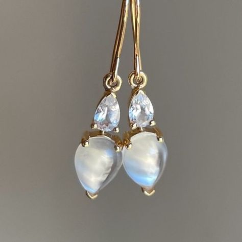 14k Paired Pear-Shaped Moonstone & White Sapphire Drop Earrings by Nicole Landaw   #nicolelandaw #futureheirlooms #augustla Luxury Moonstone Drop Jewelry, Modern Moonstone Drop Earrings, Gold Dangle Moonstone Earrings, Luxury Moonstone Drop Earrings, Luxury Elegant Moonstone Earrings, Garnet Earrings, White Sapphire, Pear Shaped, Moonstone