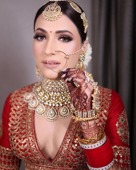 Latest Gold Nath Designs For Bride, Bridal Nath Designs, Nath Designs, Bridal Nath, Red Bride, Nath Nose Ring, Wedding Eye Makeup, Bridal Makeup Images, Indian Bridal Photos