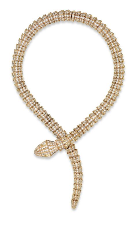 A DIAMOND ‘SERPENTI’ NECKLACE, BY BULGARI: Designed as an overlapping snake, with circular-cut diamond scales and pear-shaped diamond eyes, mounted in gold, 37.5 cm. Signed Bulgari, Italy, no. 9667. Via Christie's. Bvlgari Serpenti Necklace Gold, Bulgari Snake Necklace, Bvlgari Snake Necklace, Chanel Accessories Jewelry, Necklace Bulgari, Bvlgari Gold, Bulgari Jewelry, Bvlgari Jewelry, Snake Jewelry