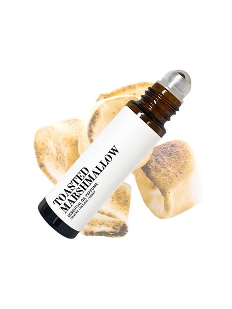 All natural and organic Toasted Marshmallow Perfume Oil is a great fragrance to wear for anyone looking for a cozy and sweet scent to wear. HOW IT SMELLS This perfume has a delicious sweet vanilla aroma with a hint of woody and spice notes. INGREDIENTS  Fractionated coconut oil, vanilla, cinnamon, nutmeg and cedarwood essential oils. PRODUCT PACKAGING This product is made in a 10mL glass bottle with a stainless steel roller ball and plastic cap. HOW TO USE Roll on wrist, temples, back of the nec Roll On Perfume Oil, Cinnamon Perfume, Marshmallow Roll, Marshmallow Perfume, Body Oil Perfume, Roller Perfume, Cinnamon Fragrance, Fragrance Lab, Organic Perfume