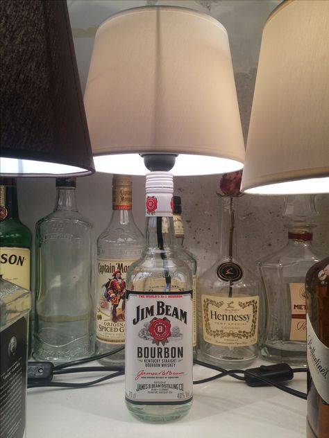 DiY Jim Beam Bottle Lamp Jim Beam Bottle Crafts, Bourbon Bottle Lamp, Bottle Lamps Diy, West Elm Floor Lamp, Whiskey Bottle Crafts, Jack Daniels Lamp, Diy Bottle Lamp, Liquor Bottle Lamp, Edison Bulb Lamp