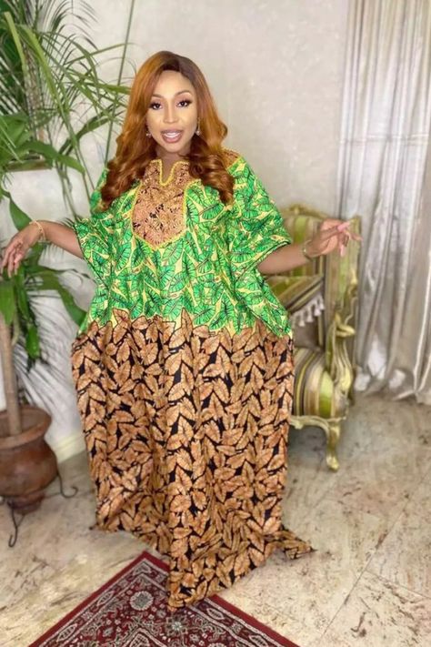 A lady wearing a boubou with embroidery Gown For Ladies, Gown For Pregnant Women, Boubou Gown, Boubou Dress, Boubou Styles, Bubu Gown, Boubou Styles For Women, Ladies Gown, Classy Women