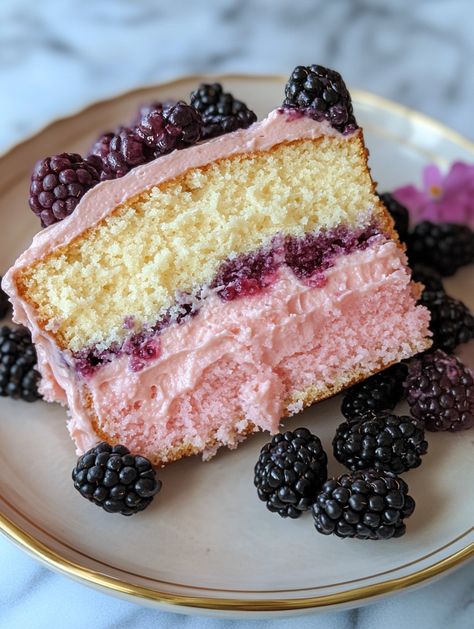 Ingredients:  2 cups flour 1 tsp baking powder ½ tsp salt 1 cup sugar ¾ cup butter 3 eggs ½ cup lavender-infused milk 1 cup fresh blackberries  Instructions:   Mix dry ingredients, cream butter, and sugar, beat in eggs and lavender-infused milk.  Fold in fresh blackberries.  Bake at 350°F (175°C) for 30 minutes.  A slice reveals juicy blackberries and a subtle lavender flavor. Blackberry Vanilla Cake, Baklava Croissant, Lemon Lavender Cake, Lavender Flavor, Satisfying Pics, Blackberry Lavender, Blackberry Cake, Lavender Cake, Halloween Food Treats