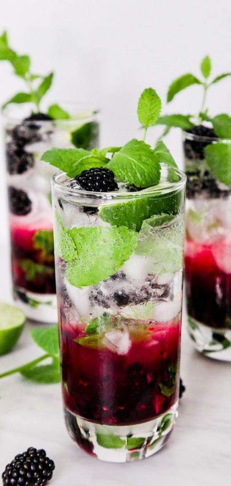 This Virgin Blackberry Mojito is sure to be your new favorite summer drink for date night in, 4th of July, or a party with your friends & family. | A virgin mojito filled with berries and fresh summer flavor that is quick & easy to make any time! Blackberry Mojito, Raspberry Mojito, Virgin Mojito, Perfect Summer Drink, Mojito Recipe, Rum Cocktails, Gin Fizz, Party Punch, Arnold Palmer