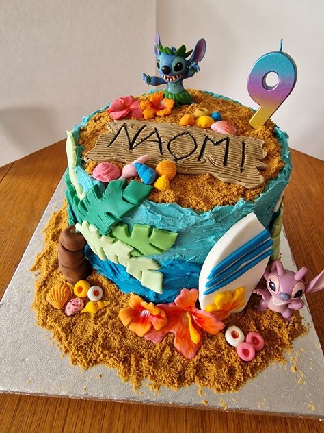 A Stitch and Angel birthday cake with them on the beach with tropical flowers, palm tree and a surfboard Stitch Cake, Beach Cakes, Stitch And Angel, Tropical Flowers, Surfboard, Cake Decorating, Pastry, The Beach, Angel