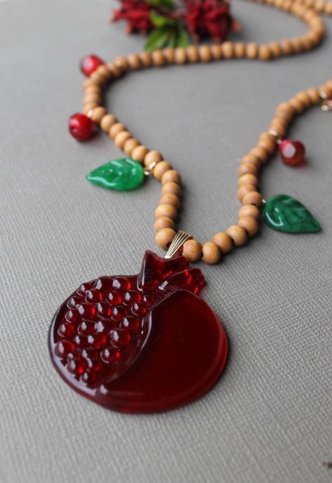 Glass Pomegranate Fruit Necklace with Seeds and Leaves Necklace With Charms, Fruit Necklace, Pomegranate Fruit, Make Earrings, Wood Bead Necklace, Group Gifts, The Fruit, How To Make Earrings, Wood Beads