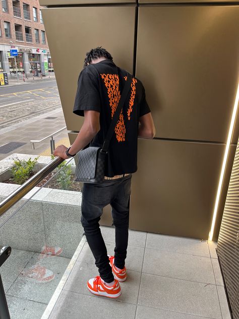 vlone tshirt, orange dunks, black jeans, lv messenger bag, burberry belt Lv Belt Men Outfit, Vlone Shirt Outfit, Lv Belt Men, Dunks Outfit Men, Lv Messenger Bag, Orange Dunks, Dunks Black, Ayo And Teo, Dunks Outfit