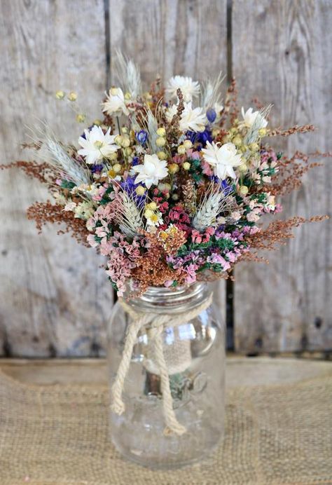 This listing is for a Country Girl Dried Flower Bouquet. I made this bouquet with fragrant preserved Sweet Annie, Annual Statice, Broom Corn, Flax, Wheat, Larkspur and Strawflowers. For a Touch of Country Charm, I tied it together with Burlap and Jute Twine. This Bouquet would be perfect for Vintage Bouquet Wedding, Romantic Wedding Flowers, Bridal Bouquet Fall, Rustic Wedding Bouquet, Dried Bouquet, Fall Wedding Bouquets, Whimsical Wonderland Weddings, Wedding Bridal Bouquets, Dried Flower Bouquet