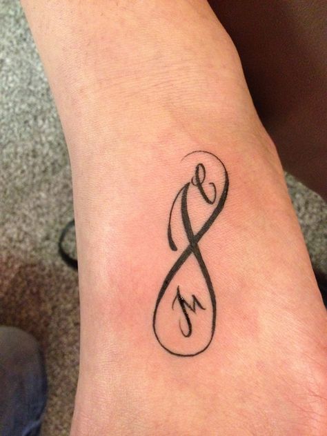 My new tattoo!  J for Jason, M for McKenzie and C for Caden= infinity C And M Tattoo, J And C Tattoo, M And J Tattoo, J And M Tattoo, Letter J Tattoo, Tattoo Journal, Tiny Tattoo Ideas, J Tattoo, Cute Tattoos On Wrist