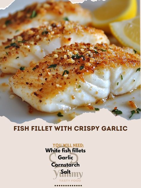 🐟🧄 Crispy, garlicky goodness! Our Fish Fillet with Crispy Garlic is a simple yet flavorful dish that’s sure to impress! #FishLovers #CrispyGarlic Fish Fillet with Crispy Garlic Ingredients: White fish fillets (4 pieces) Garlic, minced (6 cloves) Cornstarch (1/4 cup) Salt (1 tsp) Black pepper (1/2 tsp) Cooking oil (for frying) Lemon wedges (for serving) Instructions: Season fish fillets with salt and pepper. Coat fillets lightly with cornstarch. Heat oil in a pan and fry fish until golden ... Fry Fish, Crispy Garlic, Fish Fillets, White Fish, Lemon Wedge, Frying Oil, Fish Fillet, Fried Fish, Cooking Oil