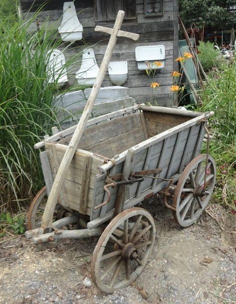 common ground : Spring Paint Refresh for the Goat Cart Medieval Wagon, Small Black Table, Goat Cart, Wooden Wheelbarrow, Wheelbarrow Planter, Wooden Cart, Wagon Wheels, Wheelbarrows, Old Wagons