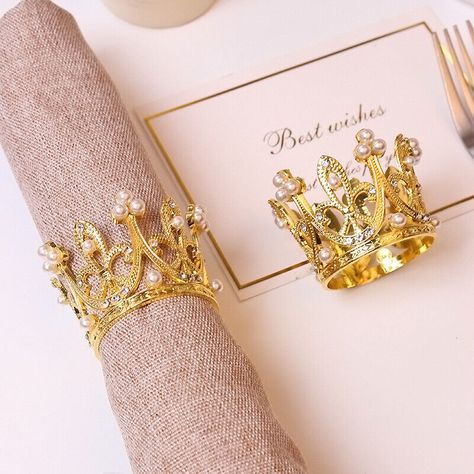 Description: Brand new. The crown napkin rings is made of alloy and embellished with pearls and rhinestones, adding a romantic and elegant atmosphere to your party. It will surely earn you a lot of compliments. Easy to clean, if it is dirty, wipe it clean with a wet sponge, just put the napkin ring in a clean place, it can be stored for a long time and applied repeatedly. Suitable for Thanksgiving dinner, Thanksgiving theme party, wedding, new year, anniversary, holiday, birthday, ceremony, banquet, wine party,evening table decoration and so on,making your dinner eating time enjoyable and comfortable. Ideal table decoration and lovely gift for any occasion and your table.   6Pcs Gold/Silver Rhinestone Pearl Crown Napkin Rings Delicate Decor for Table Description: Brand new. The crown napki Crown Napkin Rings, Crown Theme Gifts, Pearl Tablescape, Thanksgiving Theme Party, Royalty Wedding Theme, Birthday Ceremony, Rings Delicate, Kings Table, Ladies Tea