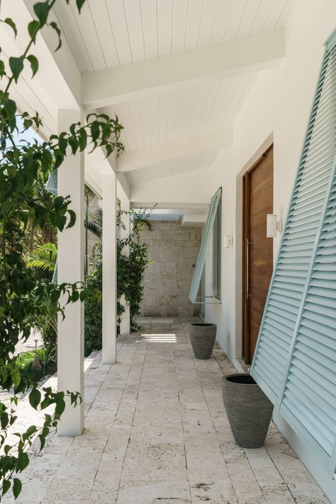 Touzet Studio offers "modern take on island architecture" in the Bahamas Carribean Homes Beach Houses, Blue Bahama Shutters, Bahamas Interior Design, Bahamas Shutters Exterior, Bahamas Architecture, Bahamas Shutters, California Mediterranean Homes, Brian Carter, Painted Shutters