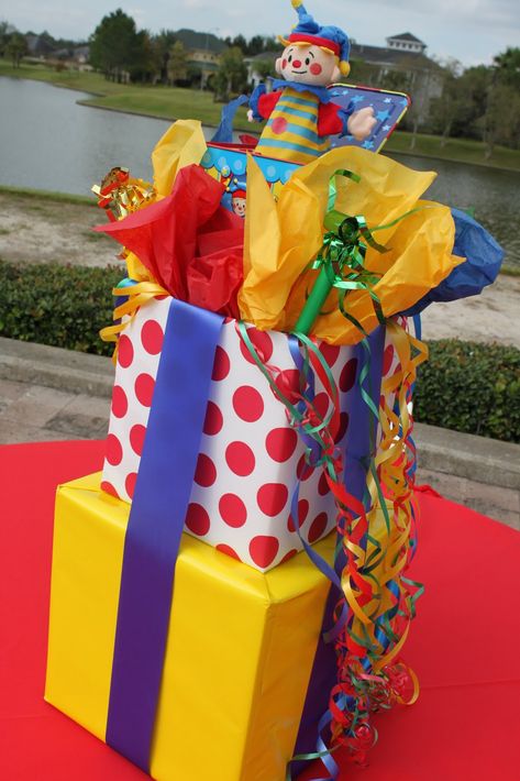 Brightly Wrapped Boxes tied with ribbon make great centerpieces - P is for Party: Real Parties: Under the Big Top Circus Centerpieces, Carnival Baby Showers, Circus Carnival Party, Carnival Decorations, Clown Party, Circus Theme Party, Carnival Themed Party, Circus Birthday Party, Carnival Birthday Parties