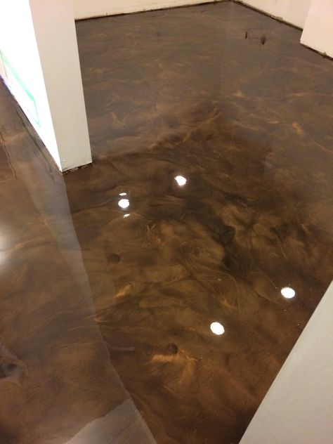 Metallic epoxy basement floor.  Colors - Brass over Coffee Sierra Concrete Arts 612-508-3036 Bronze Epoxy Floor, Brown Epoxy Floor, Copper Epoxy Floor, Epoxy Floor Basement, Metallic Epoxy Floor Basement, Solid Color Epoxy Floor, Concreat Stain Floors, Epoxy Coating, Epoxy Floor