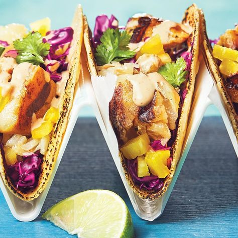 Meaty haddock meets smoky chipotle sauce in these tasty tacos, but the unsung hero is the quick-pickled cabbage that lends a bit of sour crunchiness and elevates all the other flavors. Haddock Fish Tacos, Haddock Tacos, Grilled Haddock, Chipotle Mayo Recipe, Baked Fish Tacos, Baked Haddock, Haddock Recipes, Gluten Free Fish, Chipotle Mayo