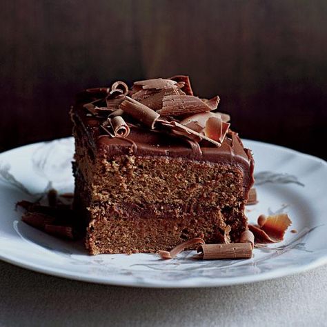 For this dessert, the ultracreamy icing, which is almost like a milk-chocolate ganache, gets spread liberally over layers of light, delicate, cocoa-flavored cake. Milk Chocolate Frosting, Layer Cake Recipes, Best Chocolate Cake, Desi Food, Chocolate Frosting, Chocolate Cake Recipe, Food Cakes, Best Chocolate, Food Snapchat