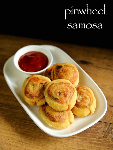 pinwheel samosa recipe | samosa pinwheels | aloo bhakarwadi with step by step photo and video recipe. there are several names to this unique samosa recipe and one such popular names is samosa rolls. unlike the traditional samosa’s, samosa roll is rolled with potato stuffing which is later sliced to individual pinwheels. these individual pinwheels would have exposure to aloo stuffing and are deep fried till crisp. Pinwheel Samosa, Samosa Pinwheels, Gulab Jamun Recipe, Jamun Recipe, Samosa Recipe, Indian Appetizers, Tandoori Masala, Pinwheel Recipes, Indian Snack Recipes