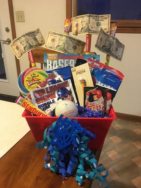 Baseball Gift Basket Ideas, Baseball Gift Basket, Football Gift Baskets, Teenager Easter Basket, Raffle Gift Basket Ideas, Teen Easter Basket, Auction Gift Basket Ideas, Gift Basket Ideas For Boyfriend, Basket Ideas For Boyfriend