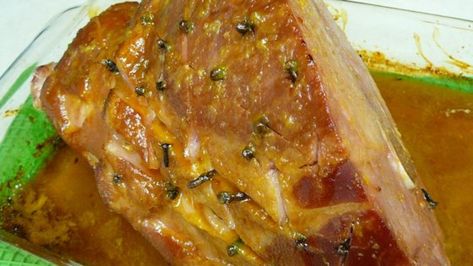 Classic, simple recipe for a clove-studded cooked ham with an orange-honey glaze. Small Baked Ham, Sweet Ham Gravy Recipe, Sweet Gravy Recipe, Best Christmas Dinner Recipes, Baked Ham Recipe, Baked Ham With Pineapple, Sausage And Rice Casserole, Ham Recipes Baked, Beans And Sausage