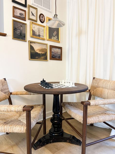 Diy Chess Table Ideas, Chess Corner In Living Room, Chess Sitting Area, Card Table Living Room, Wood Game Table, Living Room Chess Table, Chess Seating Area, Game Table In Living Room Corner, Chess Table Ideas