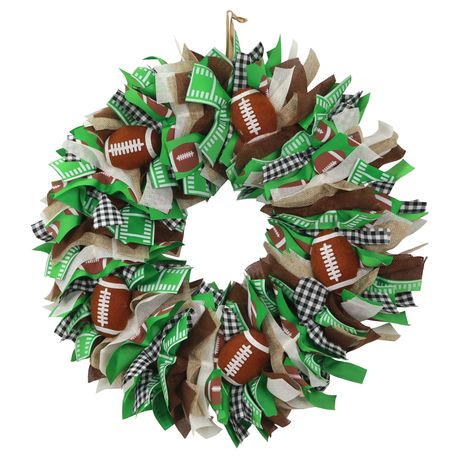 "Find the 20\" Green Fabric Football Wreath by Celebrate It™ at Michaels. This green fabric football wreath is perfect for lending your home a fun, festive vibe for football season. This green fabric football wreath is perfect for lending your home a fun, festive vibe for football season. Details: Green 20\" Polyester, polyfoam, and jute Recommended for indoor use | 20\" Green Fabric Football Wreath by Celebrate It™ | Michaels®" Football Wreath Diy, Football Wreaths, Sports Wreath, Envelope Template Printable, Thanksgiving Football, Football Crafts, Football Fever, Sports Wreaths, Football Wreath