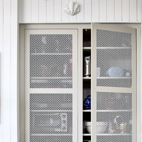 Unique Kitchens and Baths on Instagram: "The perfect little pantry cabinet!  Did you know that we can create any door style and color you desire? This beautiful pantry was created with metal mesh doors painted to match the beautiful drawer boxes. Let us design and build your next kitchen.  Cabinetry @uniquekitchensandbaths   Interior design @winsomeinteriordesign   Photo @stacyzaringoldberg" Metal Mesh Cabinet Doors, Beautiful Pantry, Mesh Doors, Drawer Boxes, Caravan Interior, Mesh Door, Upper Cabinets, Drawer Box, Pantry Cabinet