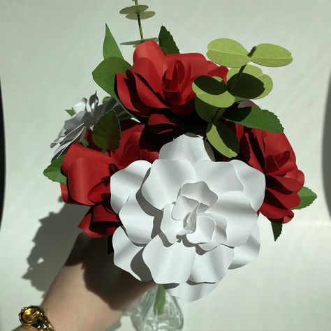 Gardenias and roses 🌹 This bouquet was a custom order of someone’s two favorite flowers. I liked it so much that I’m adding it to my shop as one of my regular listings! I love the dramatic contrast of the red roses against the white gardenias, and I also enjoy the mix of different petal shapes and textures in this bouquet. It’s full of dimension, and makes the sunlight create such dramatic shadows. ✨ #etsyshop #artist #floralartist #giftidea #paperbouquet #paperflowers #smallbusinesswoman White Gardenia, Paper Bouquet, Favorite Flowers, Paper Flowers, The White, Red Roses, Roses, Etsy Shop, I Love