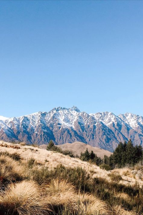 How stunning are the Remarkables in Queenstown, New Zealand?! Find out how to get the most out of your trip to Queenstown during winter. Youll find out about the best hikes and short walks, best adventure tourism activities to try and much more! Queenstown Hill | Remarkables | Queenstown Guide | Travel New Zealand | Winter in New Zealand | Must do's in Queenstown | Mountains | Outdoors | Queenstown Photography | Bucketlist Destination New Zealand Mountains Landscapes, The Remarkables Queenstown, The Remarkables Nz, New Zealand Queenstown Aesthetic, Queenstown New Zealand Photography, Queenstown Photography, Remarkables Queenstown, Queenstown Winter, New Zealand Winter