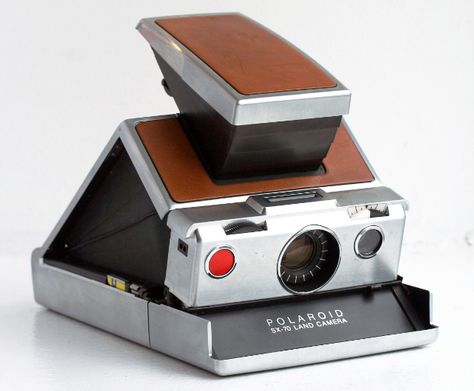 Blast From The Past: Classic Commercial for the Polaroid SX-70 Land Camera Polaroid Camera Film, Old Polaroid, Brown Chrome, Fotocamere Vintage, Film Polaroid, Vintage Film Camera, Instant Photography, Antique Cameras, Instant Film Camera