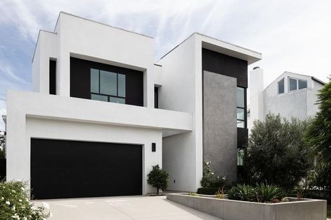 Exterior Garage Lighting Ideas and Inspiration | Hunker Two Tone Exterior House Colors, Modern Garage Doors, Exterior House Color, Modern Garage, Minimalist House Design, Modern Architecture House, Farmhouse Exterior, Minimalist Architecture, Exterior House Colors