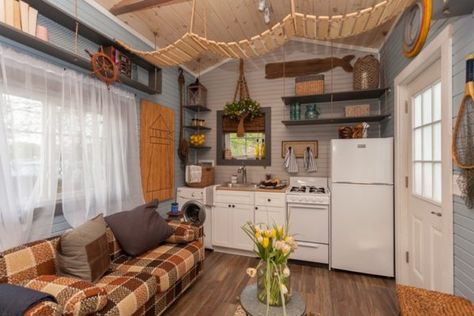 200 Sq. Ft. Cape Cod Inspired Tiny House on Wheels Tiny House Kitchen Storage, Tiny House Nation, Activity Room, Tiny House Kitchen, House Fan, Floor Bed, Tiny Spaces, Tiny House Interior, Tiny House Living