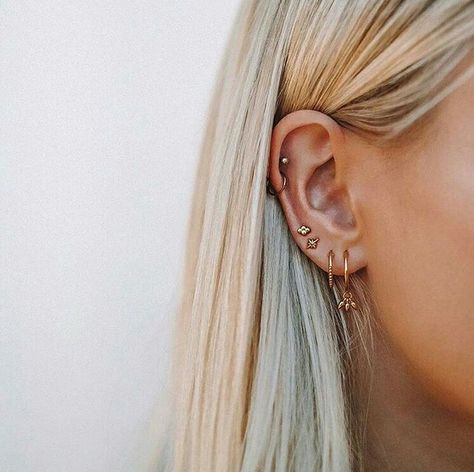 delicate earrings, multiple earrings in one ear, multiple ear piercings, dainty gold earrings, Ear Cuffs, Ear Piercings, Blonde Hair, Piercings, A Woman, Blonde, Hair, Gold