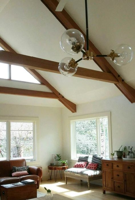 Vaulted Ceiling with Cedar Trusses and High Triangle Window | deedsdesign Vaulted Windows Living Room, Triangle Ceiling, Half Vaulted Ceiling Living Room, Vaulted Ceiling Decor, Vaulted Ceiling Bedroom, Triangle Window, Vaulted Ceiling Lighting, Vaulted Ceiling Kitchen, Tv Over Fireplace