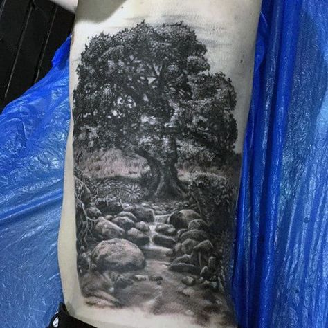 Tree Tattoo Ribs, Black Tree Tattoo, Oak Tree Tattoo Designs, Stream Tattoo, Oak Tattoo, Palm Tree Tattoo Ankle, Evergreen Tree Tattoo, Black Oak Tree, Bonsai Tree Tattoos