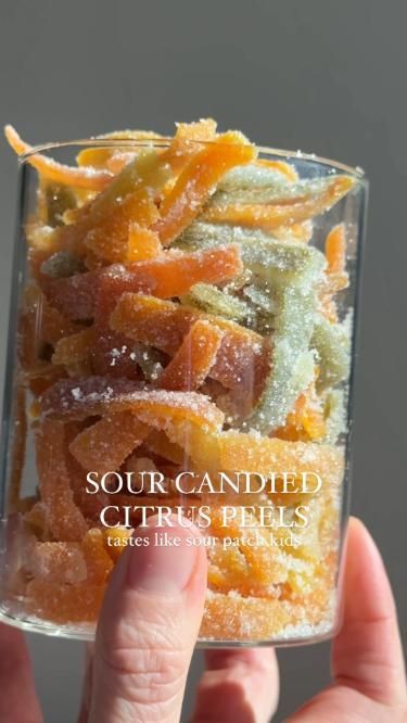 These Sour Candied Citrus Peels taste like sour patch kids, just without all the ingredients you can't pronounce! They're chewy, sweet, sour, and they're pretty easy to make with just 3 ingredients. Snacks At Home, Candied Citrus, Crowded Kitchen, Gummy Candies, Candy Recipes Homemade, Sweet Dishes Recipes, Quick Recipes Snacks, Real Fruit, Sour Patch Kids